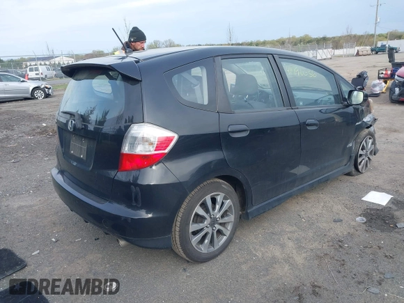 2012 Honda Fit Sport with VIN JHMGE8H52CC022386, listed as a IAAI auction lot 41996636 with 123,070 mi miles. Bid and sale history available at carsss.com. Image 4.