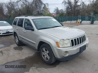 2007 Jeep Grand Cherokee Laredo z VIN 1J8HR48P77C548578, wystawiony jako IAAI lot #41974603 z przebiegiem 179 280 mil mil oraz . Historia ofert i sprzedaży dostępna na DreamBid. Obrazek 1.