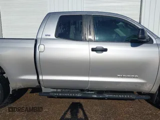 2014 Toyota Tundra SR with VIN 5TFRM5F13EX078411, listed as a IAAI auction lot 42702477 with 123,336 mi miles and . Bid and sale history available at DreamBid. Image 13.