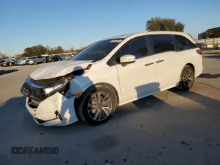 2021 Honda Odyssey Touring with VIN 5FNRL6H80MB004469, listed as a Copart auction lot 87837905 with 54,472 mi miles and Non Repairable. Bid and sale history available at carsss.com. Image 1.