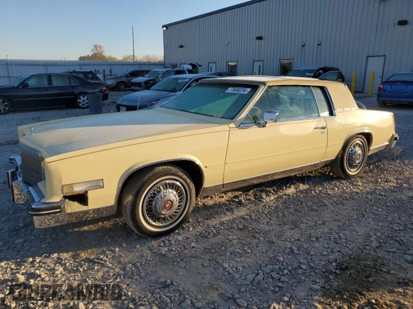 1985 Cadillac Eldorado z VIN 1G6EL5781FE647818, wystawiony jako Copart lot #77608224 z przebiegiem 7 192 mil mil oraz Czysty tytuł • Clean title. Historia ofert i sprzedaży dostępna na DreamBid. Obrazek 1.