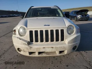 2007 Jeep Compass Sport with VIN 1J8FF47W07D199198, listed as a Copart auction lot 52092675 with 131,346 mi miles and Salvage Title. Bid and sale history available at carsss.com. Image 5.