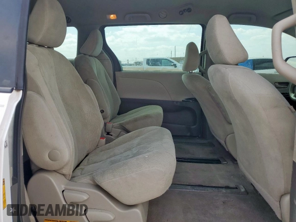 2014 Toyota Sienna L with VIN 5TDZK3DC9ES504168, listed as a Copart auction lot 53580095 with 253,688 mi miles and Salvage Title. Bid and sale history available at carsss.com. Image 11.