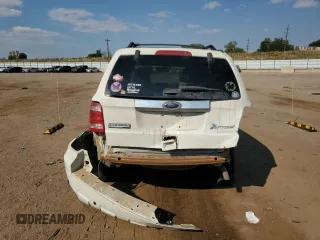 2012 Ford Escape Hybrid z VIN 1FMCU5K3XCKA58465, wystawiony jako Copart lot #75527194 z przebiegiem 263 996 mil mil oraz Szkoda całkowita • Salvage title. Historia ofert i sprzedaży dostępna na DreamBid. Obrazek 6.
