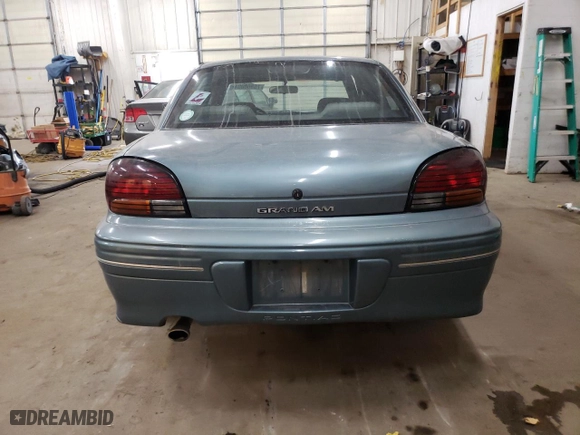 1997 Pontiac Grand Am SE with VIN 1G2NE52M8VC721326, listed as a Copart auction lot 75860034 with NaN miles and Salvage Title. Bid and sale history available at carsss.com. Image 6.