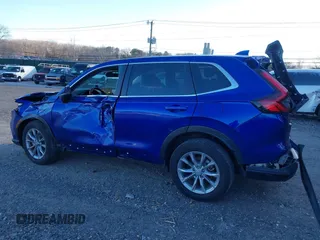 2023 Honda CR-V EX-L with VIN 2HKRS4H75PH409974, listed as a IAAI auction lot 41239530 with 22,403 mi miles. Bid and sale history available at carsss.com. Image 3.