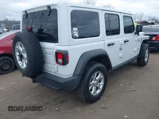 2021 Jeep Wrangler Unlimited Willys Sport with VIN 1C4HJXDG8MW596171, listed as a IAAI auction lot 41856841 with 86,353 mi miles and . Bid and sale history available at DreamBid. Image 4.