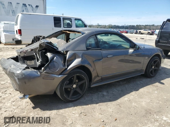 2003 Ford Mustang GT Deluxe with VIN 1FAFP42X73F352524, listed as a Copart auction lot 46752105 with 175,142 mi miles and Salvage Title. Bid and sale history available at carsss.com. Image 3.
