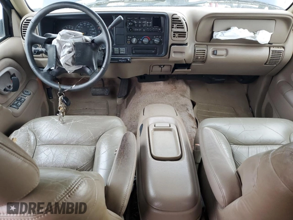1997 GMC Suburban with VIN 3GKFK16R4VG519902, listed as a Copart auction lot 79031204 with 195,624 mi miles and Salvage Title. Bid and sale history available at DreamBid. Image 8.