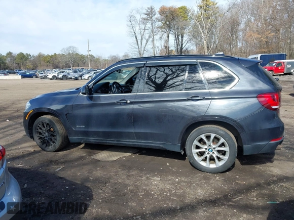 2014 BMW X5 xDrive35i with VIN 5UXKR0C55E0K47655, listed as a IAAI auction lot 41643776 with 154,380 mi miles. Bid and sale history available at carsss.com. Image 14.