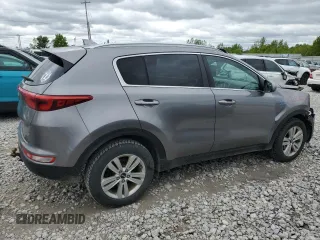 2017 Kia Sportage LX z VIN KNDPMCAC6H7183873, wystawiony jako Copart lot #58050925 z przebiegiem 116 754 mil mil oraz Czysty tytuł • Clean title. Historia ofert i sprzedaży dostępna na DreamBid. Obrazek 3.