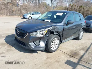 2015 Mazda CX-5 Sport with VIN JM3KE4BY1F0526755, listed as a IAAI auction lot 41768916 with 197,675 mi miles. Bid and sale history available at carsss.com. Image 2.