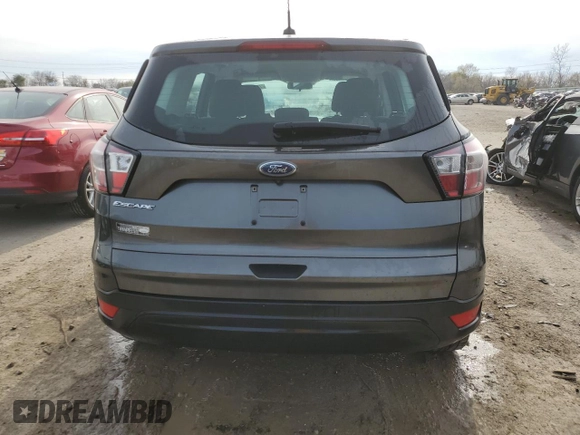 2017 Ford Escape S with VIN 1FMCU0F74HUB97616, listed as a Copart auction lot 79323164 with 113,199 mi miles and Salvage title. Bid and sale history available at DreamBid. Image 6.