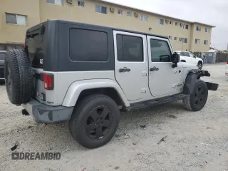 2010 Jeep Wrangler Unlimited Sahara with VIN 1J4BA5H17AL117410, listed as a Copart auction lot 88519555 with 126,471 mi miles and Salvage Title. Bid and sale history available at carsss.com. Image 3.