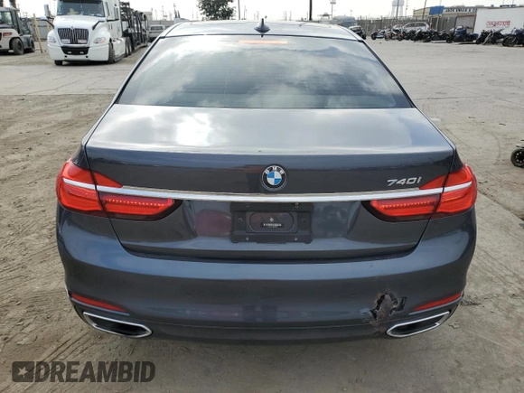 2016 BMW 7 Series 740i with VIN WBA7E2C51GG546677, listed as a Copart auction lot 63455445 with 106,553 mi miles and Salvage title. Bid and sale history available at DreamBid. Image 6.