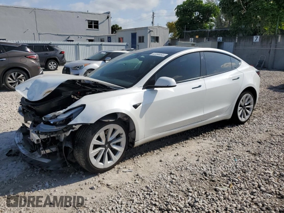 2023 Tesla Model 3 with VIN 5YJ3E1EA6PF510323, listed as a Copart auction lot 52094495 with 115,928 mi miles and Salvage Title. Bid and sale history available at DreamBid. Image 1.