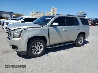 2015 GMC Yukon SLT with VIN 1GKS2BKC4FR100665, listed as a Copart auction lot 48165535 with 138,842 mi miles and Salvage Title. Bid and sale history available at carsss.com. Image 1.