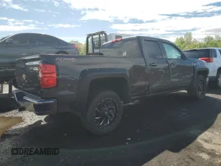 2015 Chevrolet Silverado 1500 LT with VIN 1GCVKREH4FZ197651, listed as a Copart auction lot 55634725 with Not Provided miles and Salvage Title. Bid and sale history available at DreamBid. Image 3.