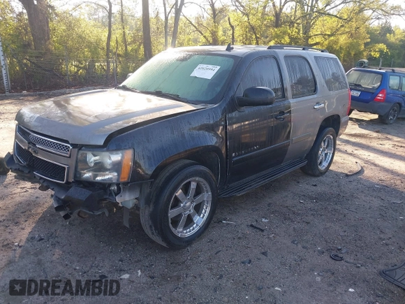 2008 Chevrolet Tahoe 1LT z VIN 1GNFC13048R216130, wystawiony jako IAAI lot #42020994 z przebiegiem 300 721 mil mil oraz . Historia ofert i sprzedaży dostępna na DreamBid. Obrazek 2.