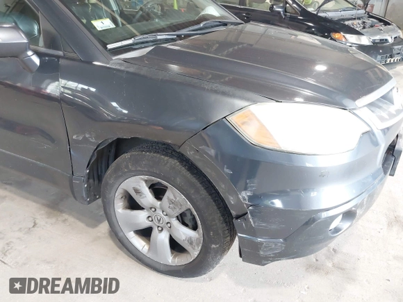 2007 Acura RDX with VIN 5J8TB18207A007085, listed as a IAAI auction lot 42556748 with 303,475 mi miles and . Bid and sale history available at DreamBid. Image 6.