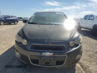 2014 Chevrolet Sonic LTZ with VIN 1G1JE5SB9E4103444, listed as a Copart auction lot 46949955 with 120,986 mi miles and Clean Title. Bid and sale history available at carsss.com. Image 5.