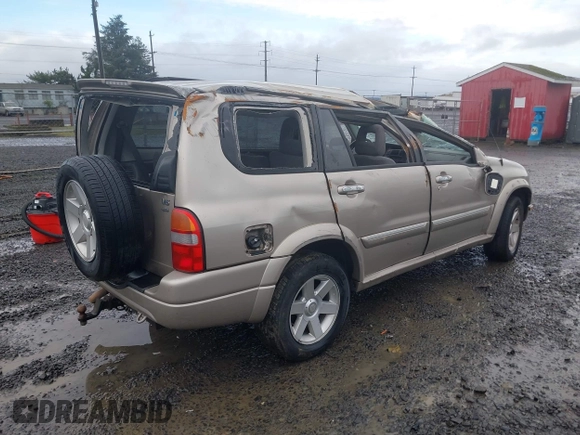 2001 Suzuki XL7 Standard z VIN JS3TX92VX14114699, wystawiony jako IAAI lot #41085552 z przebiegiem 195 316 mil mil oraz . Historia ofert i sprzedaży dostępna na DreamBid. Obrazek 4.