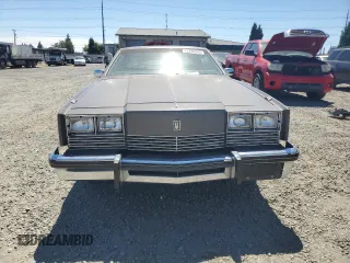 1983 Oldsmobile Toronado with VIN 1G3AZ57Y8DE312949, listed as a Copart auction lot 65228244 with 159,172 mi miles and Salvage Title. Bid and sale history available at DreamBid. Image 5.