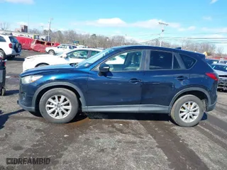 2016 Mazda CX-5 Touring with VIN JM3KE4CY6G0717393, listed as a IAAI auction lot 41596084 with 150,774 mi miles. Bid and sale history available at carsss.com. Image 14.