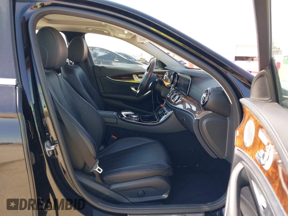 2018 Mercedes-Benz E 300 with VIN WDDZF4JB2JA351345, listed as a IAAI auction lot 41974757 with 53,948 mi miles and . Bid and sale history available at DreamBid. Image 5.