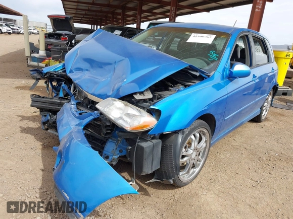 2005 Kia Spectra with VIN KNAFE161655095608, listed as a IAAI auction lot 41990765 with 51,415 mi miles. Bid and sale history available at carsss.com. Image 17.
