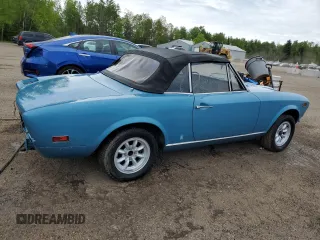 1974 FIAT 124 Spider z VIN 124CS10081683, wystawiony jako Copart lot #58650195 z przebiegiem 143 647 mil mil oraz Czysty tytuł • Clean title. Historia ofert i sprzedaży dostępna na DreamBid. Obrazek 3.
