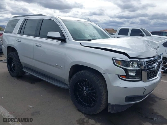 2018 Chevrolet Tahoe LT with VIN 1GNSCBKC2JR115318, listed as a IAAI auction lot 41809253 with 107,217 mi miles. Bid and sale history available at carsss.com. Image 1.