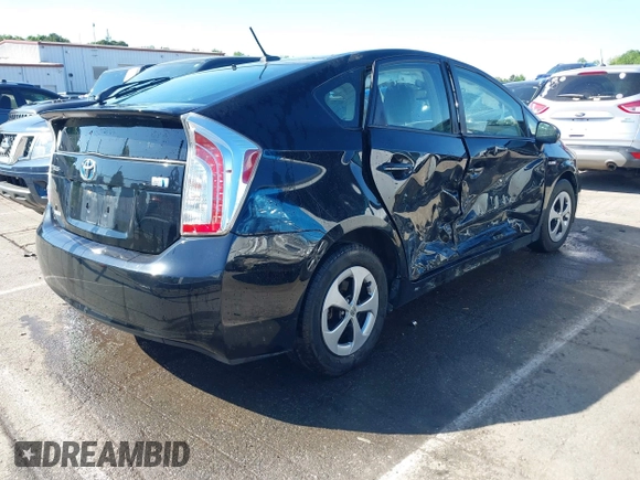 2013 Toyota Prius One with VIN JTDKN3DU5D1721701, listed as a IAAI auction lot 42039097 with 167,497 mi miles and . Bid and sale history available at DreamBid. Image 4.