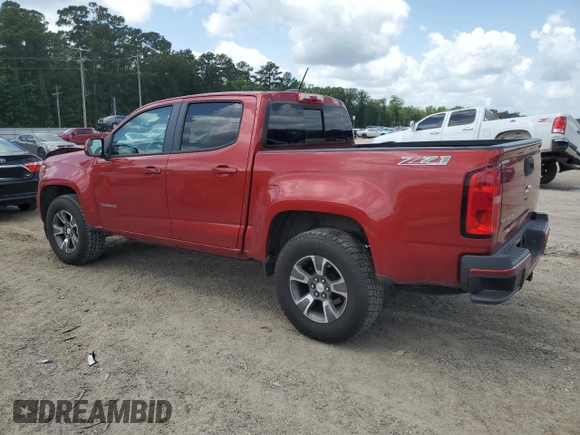 2016 Chevrolet Colorado 4WD Z71 with VIN 1GCGTDE34G1131064, listed as a Copart auction lot 61369585 with 137,769 mi miles and Salvage title. Bid and sale history available at DreamBid. Image 2.