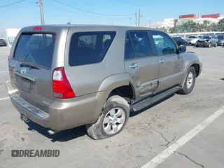 2007 Toyota 4Runner SR5 with VIN JTEZU14R970095027, listed as a IAAI auction lot 41676068 with 212,288 mi miles and . Bid and sale history available at DreamBid. Image 4.