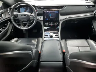2023 Jeep Grand Cherokee Overland with VIN 1C4RJHDG0PC670537, listed as a Copart auction lot 56757285 with 24,735 mi miles and Salvage title. Bid and sale history available at DreamBid. Image 8.