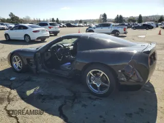 2002 Chevrolet Corvette with VIN 1G1YY22G825121021, listed as a Copart auction lot 49741235 with 104,964 mi miles and Salvage Title. Bid and sale history available at carsss.com. Image 2.