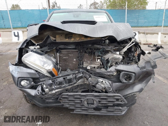 2020 Toyota Tacoma SR5 z VIN 3TMCZ5AN6LM323920, wystawiony jako IAAI lot #41885427 z przebiegiem 153 952 mil mil oraz . Historia ofert i sprzedaży dostępna na DreamBid. Obrazek 12.