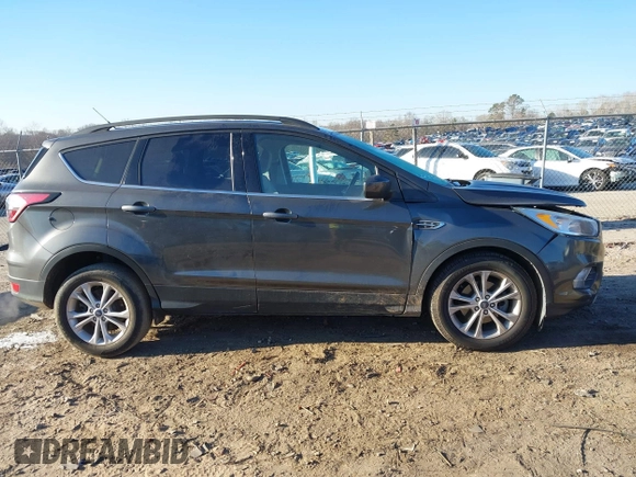 2018 Ford Escape SE with VIN 1FMCU0GD0JUA87303, listed as a IAAI auction lot 41612502 with 70,233 mi miles. Bid and sale history available at carsss.com. Image 14.