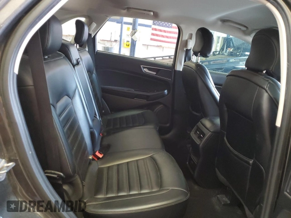 2019 Ford Edge SEL with VIN 2FMPK4J95KBB76844, listed as a Copart auction lot 59323925 with 122,326 mi miles and Salvage title. Bid and sale history available at DreamBid. Image 11.