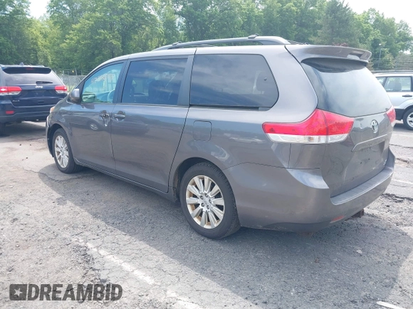 2011 Toyota Sienna XLE with VIN 5TDDK3DC8BS028176, listed as a IAAI auction lot 42592654 with 161,992 mi miles and . Bid and sale history available at DreamBid. Image 3.