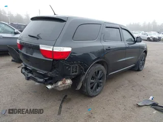 2013 Dodge Durango R/T with VIN 1C4SDJCT8DC520864, listed as a IAAI auction lot 41897974 with 170,580 mi miles and . Bid and sale history available at DreamBid. Image 4.
