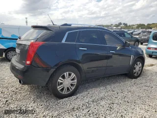 2014 Cadillac SRX Luxury Collection with VIN 3GYFNBE39ES633570, listed as a Copart auction lot 47584115 with 164,415 mi miles and Salvage Title. Bid and sale history available at carsss.com. Image 3.
