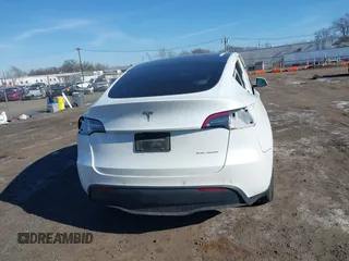 2022 Tesla Model Y Long Range with VIN 7SAYGAEE3NF337220, listed as a IAAI auction lot 41703912 with 46,319 mi miles and . Bid and sale history available at carsss.com. Image 16.