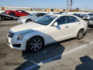 2014 Cadillac ATS Luxury AWD z VIN 1G6AH5R33E0150864, wystawiony jako Copart lot #72983954 z przebiegiem 165 472 mil mil oraz Szkoda całkowita • Salvage title. Historia ofert i sprzedaży dostępna na DreamBid. Obrazek 1.