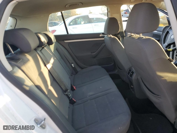 2009 Volkswagen Rabbit S with VIN WVWDB71KX9W028483, listed as a Copart auction lot 89188435 with 156,605 mi miles and Salvage Title. Bid and sale history available at carsss.com. Image 10.