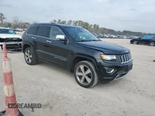 2015 Jeep Grand Cherokee Overland with VIN 1C4RJFCT6FC628729, listed as a Copart auction lot 44979155 with 105,959 mi miles and Salvage Title. Bid and sale history available at DreamBid. Image 4.