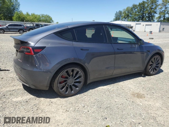 2022 Tesla Model Y Performance with VIN 7SAYGDEF3NF384161, listed as a Copart auction lot 59989145 with 12,731 mi miles and Salvage title. Bid and sale history available at DreamBid. Image 3.