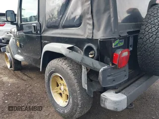 2006 Jeep Wrangler Sport z VIN 1J4FA49S06P721223, wystawiony jako IAAI lot #42654272 z przebiegiem 225 223 mil mil oraz . Historia ofert i sprzedaży dostępna na DreamBid. Obrazek 17.