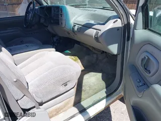 1996 Chevrolet Suburban with VIN 1GNFK16R9TJ411712, listed as a IAAI auction lot 42070739 with 242,044 mi miles. Bid and sale history available at carsss.com. Image 5.